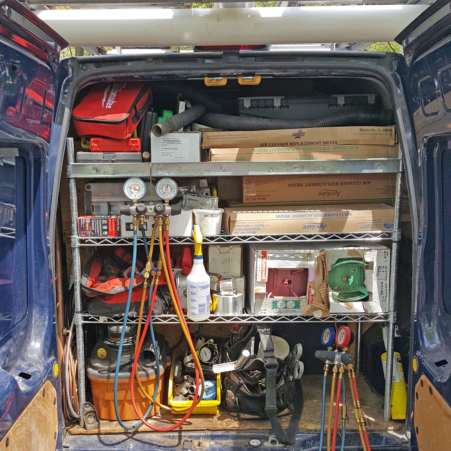 Back of HVAC truck, showing the tools